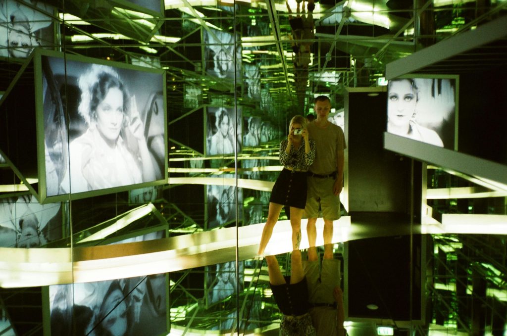 Image of a couple in a AI museum